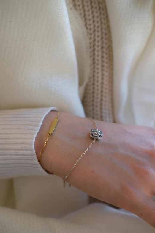 the woman wears her wrist as she wears a gold celet