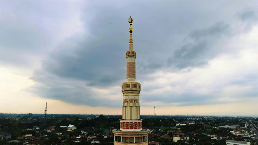 a very tall building on top of a city street