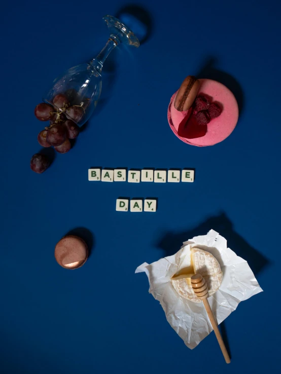 the words father's day spelled out in letters with food on a plate