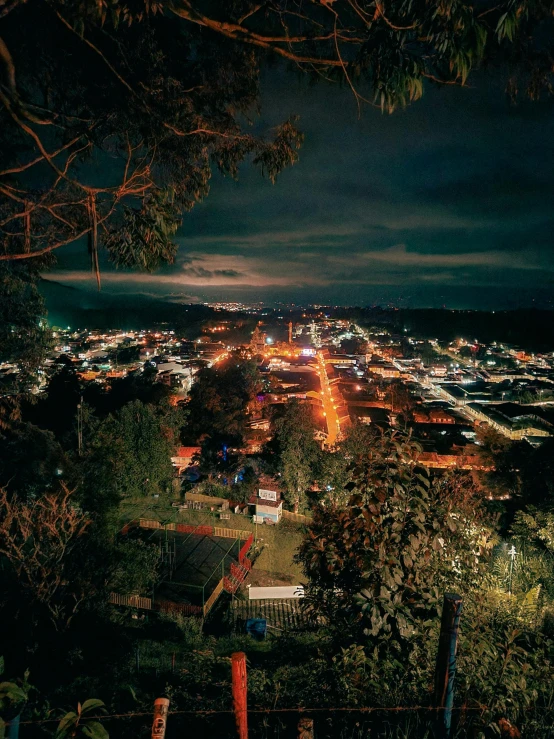 an elevated view looking down on a city at night