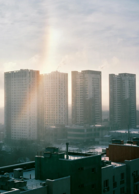 a picture looking down at the skyline with tall buildings