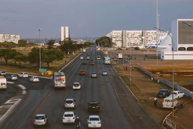 there are cars and trucks in an interstate