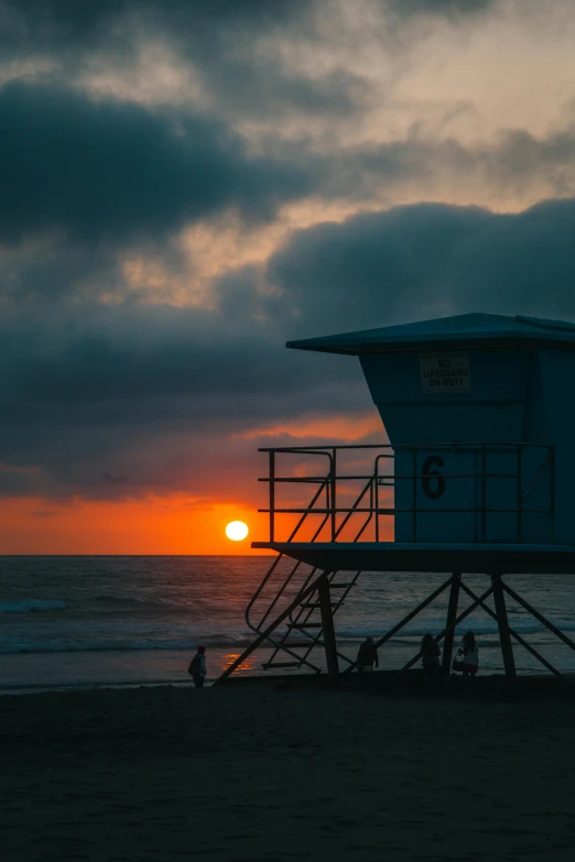 a life guard tower on top of the ocean