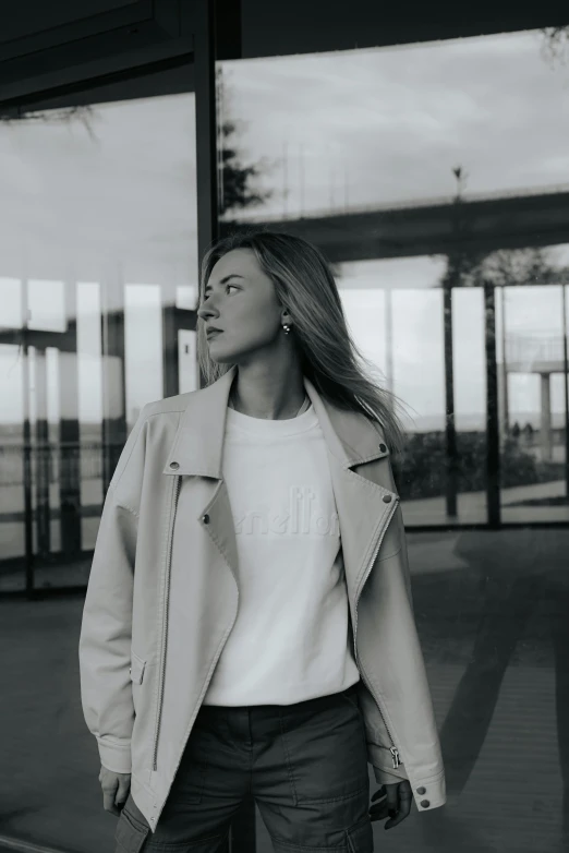 black and white po of young woman with wind swept hair