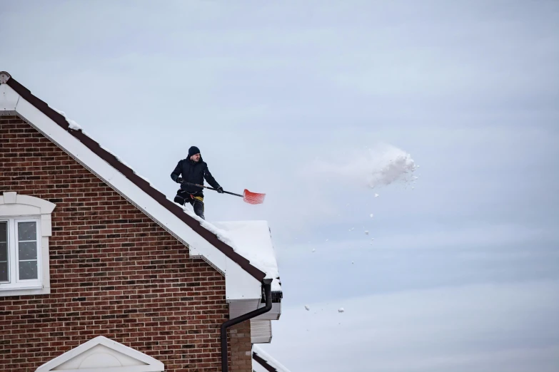 an image of a man that is on top of a building