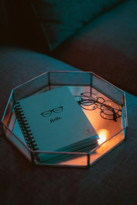 the lighted glass coaster has glasses on top
