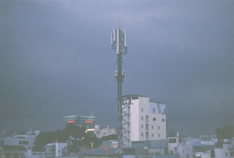a large cellphone tower on top of a building