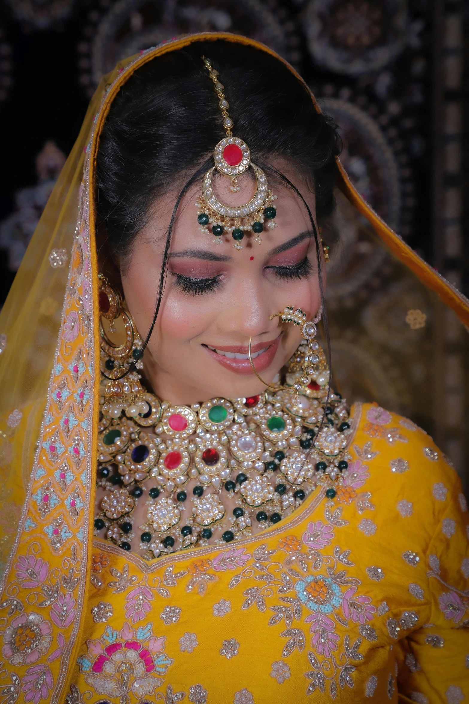 a bride in yellow poses for a wedding portrait