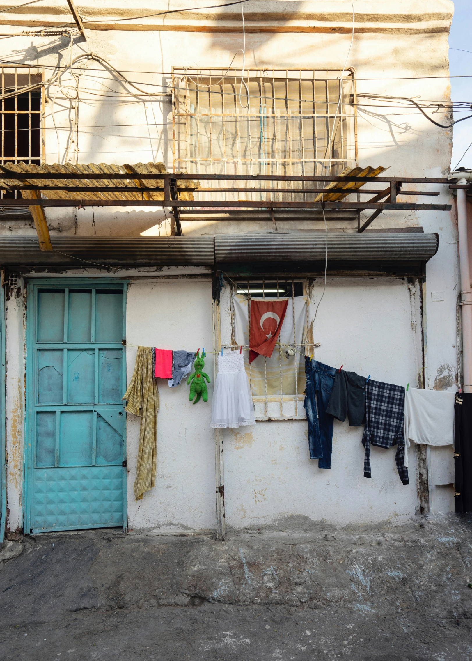 clothes hung out to dry outside of a building