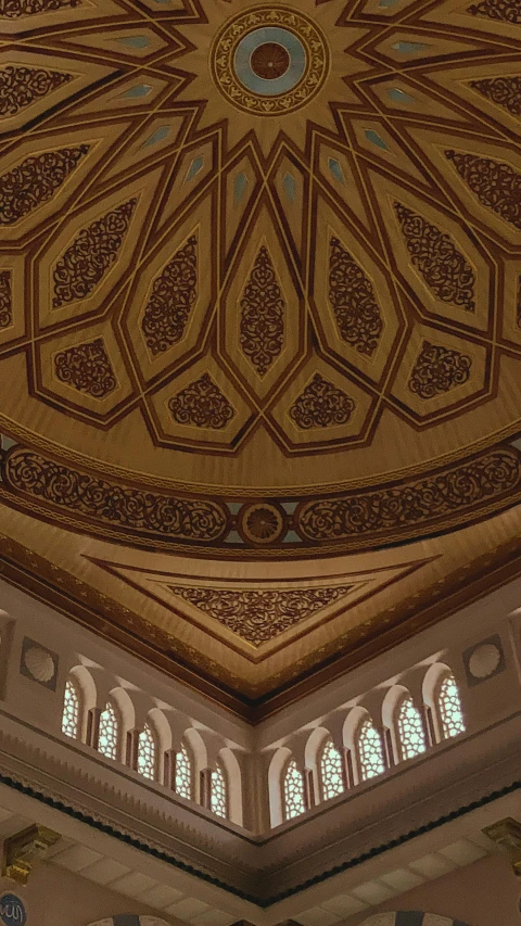 inside view of a large dome with intricate designs