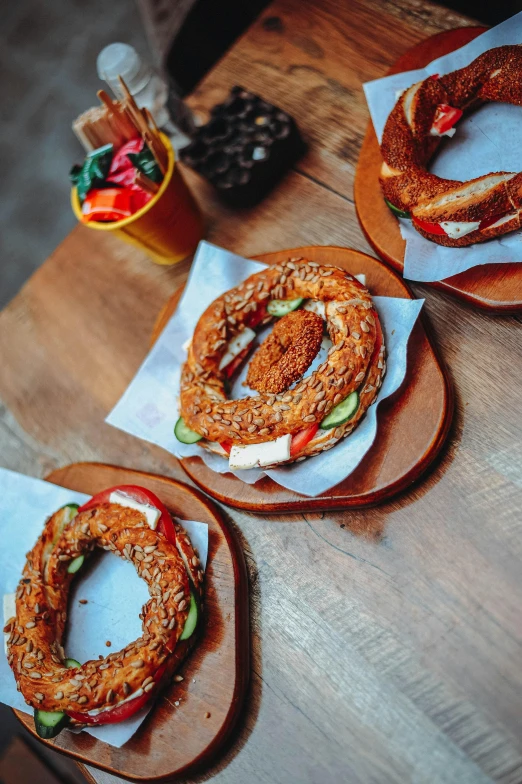 several bagels with donuts on their backs