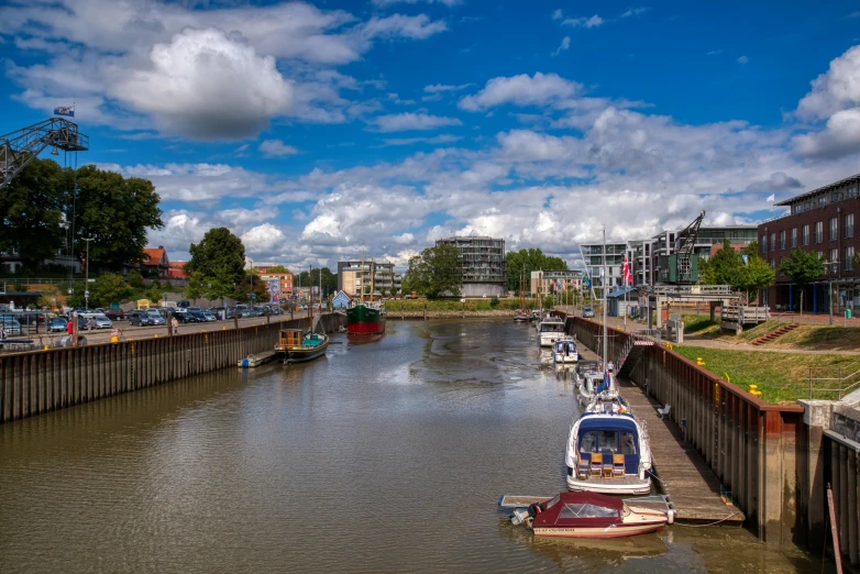 a view of a canal lined with boats