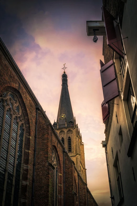 an old church steeple with a cross on it