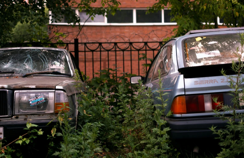 a couple of cars parked next to each other