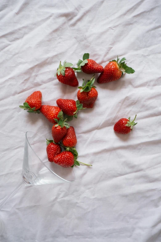 there are strawberries placed on a table top