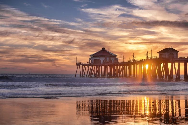 a view of the ocean with a very big wooden structure in it