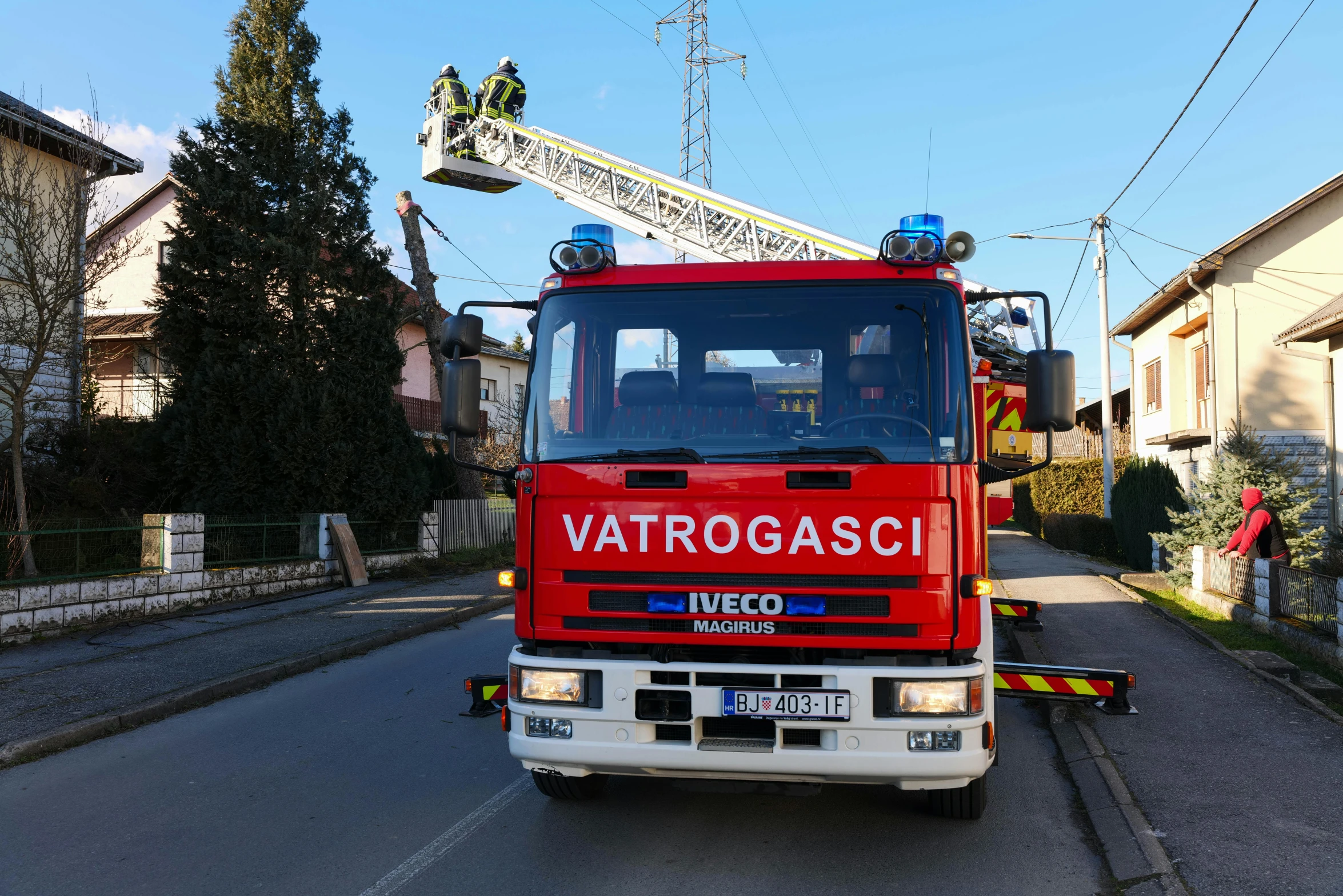 a red fire truck sits in the road