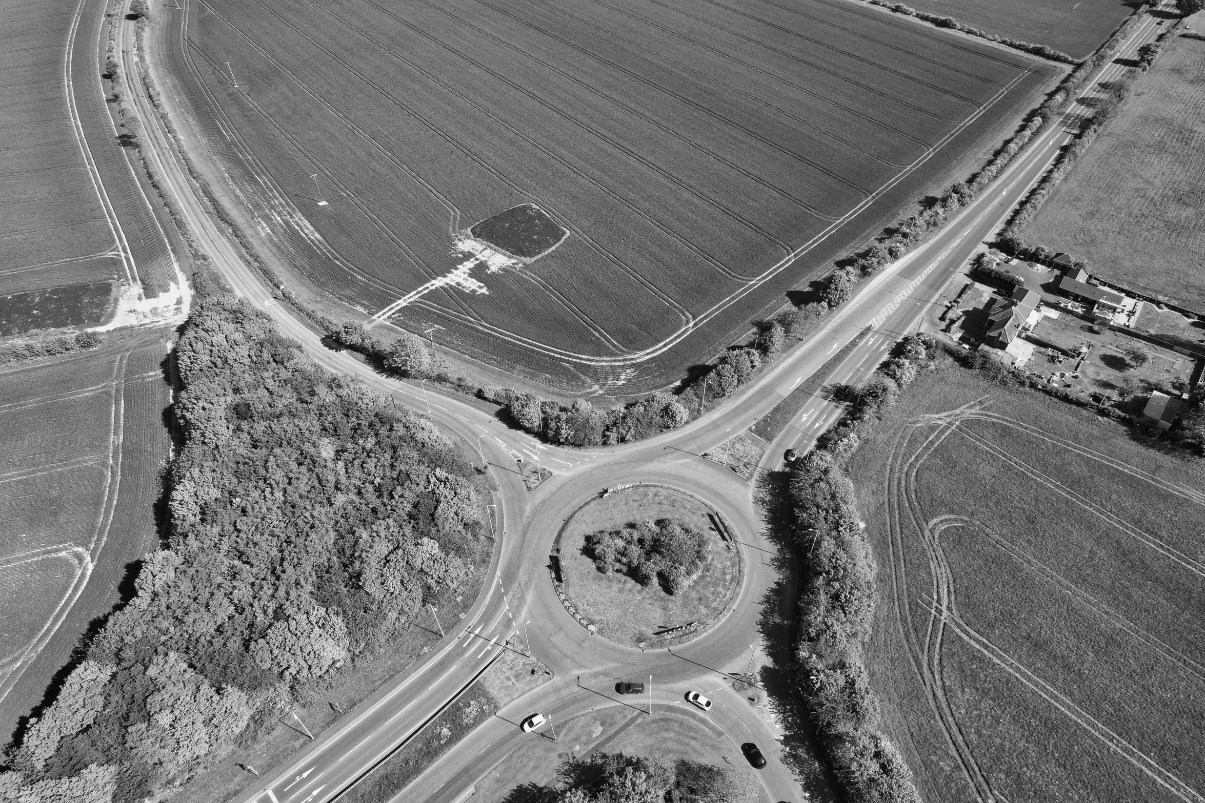 aerial view of a road and circular intersection