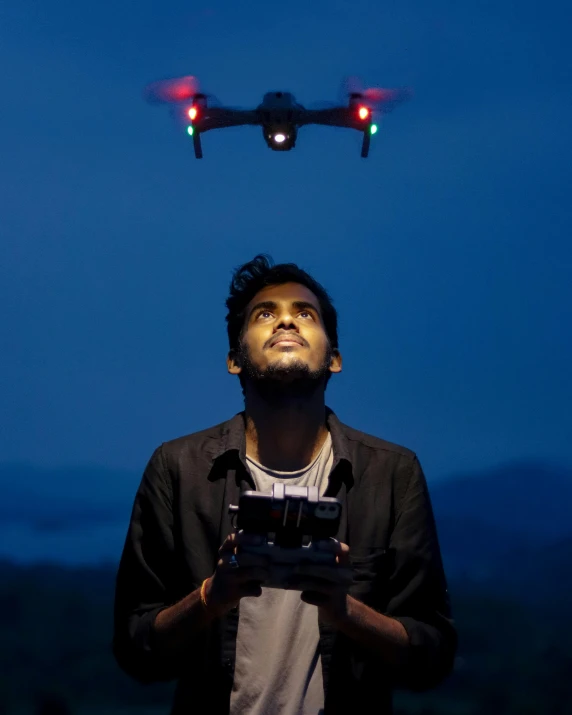 a man taking a pograph of a propellor with a camera