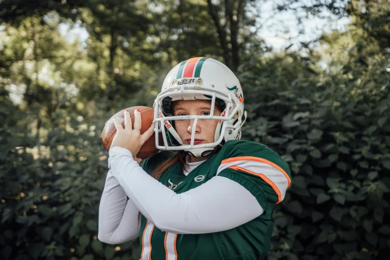 a girl football player is in uniform