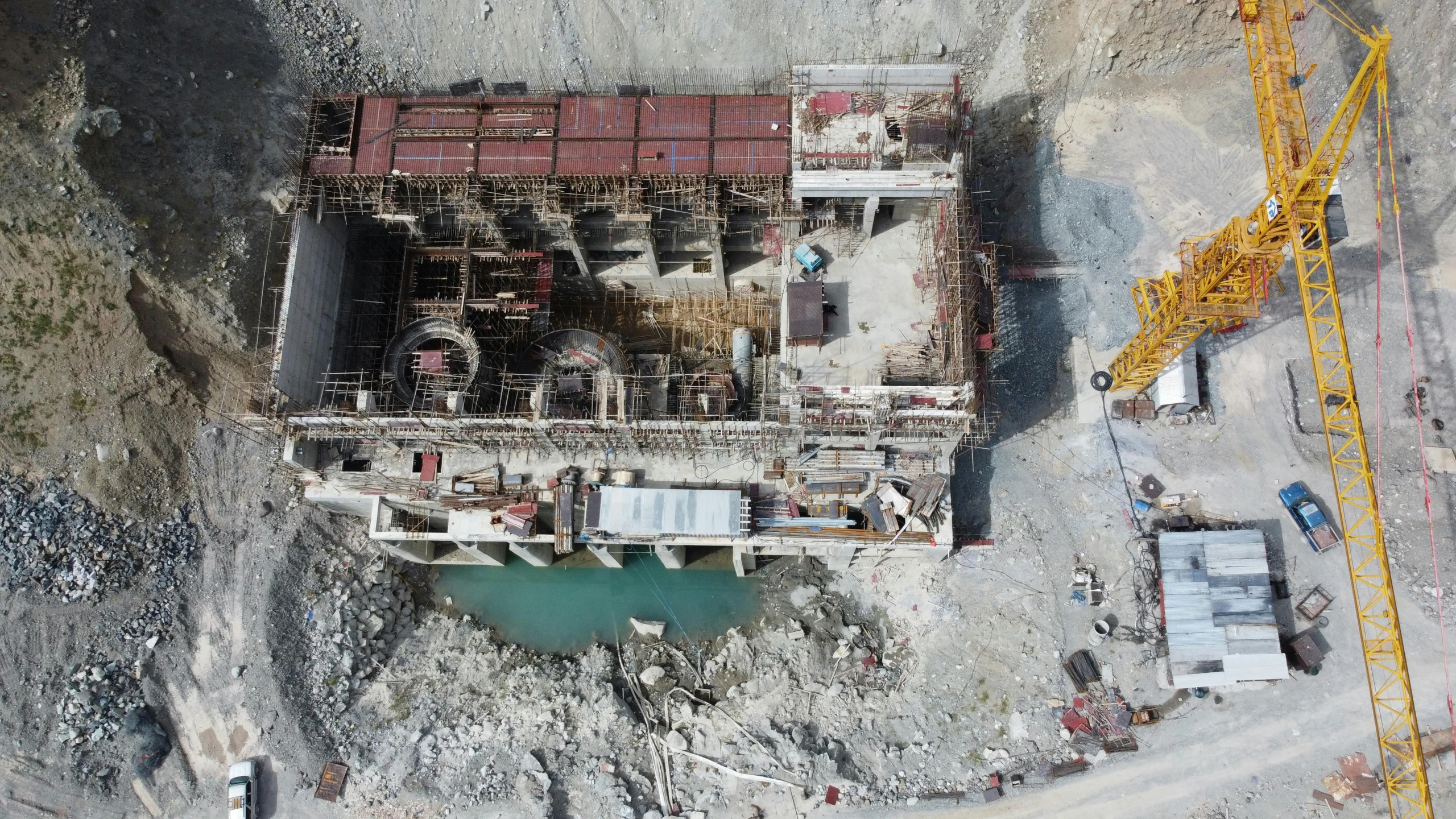 aerial view of a construction site near a river