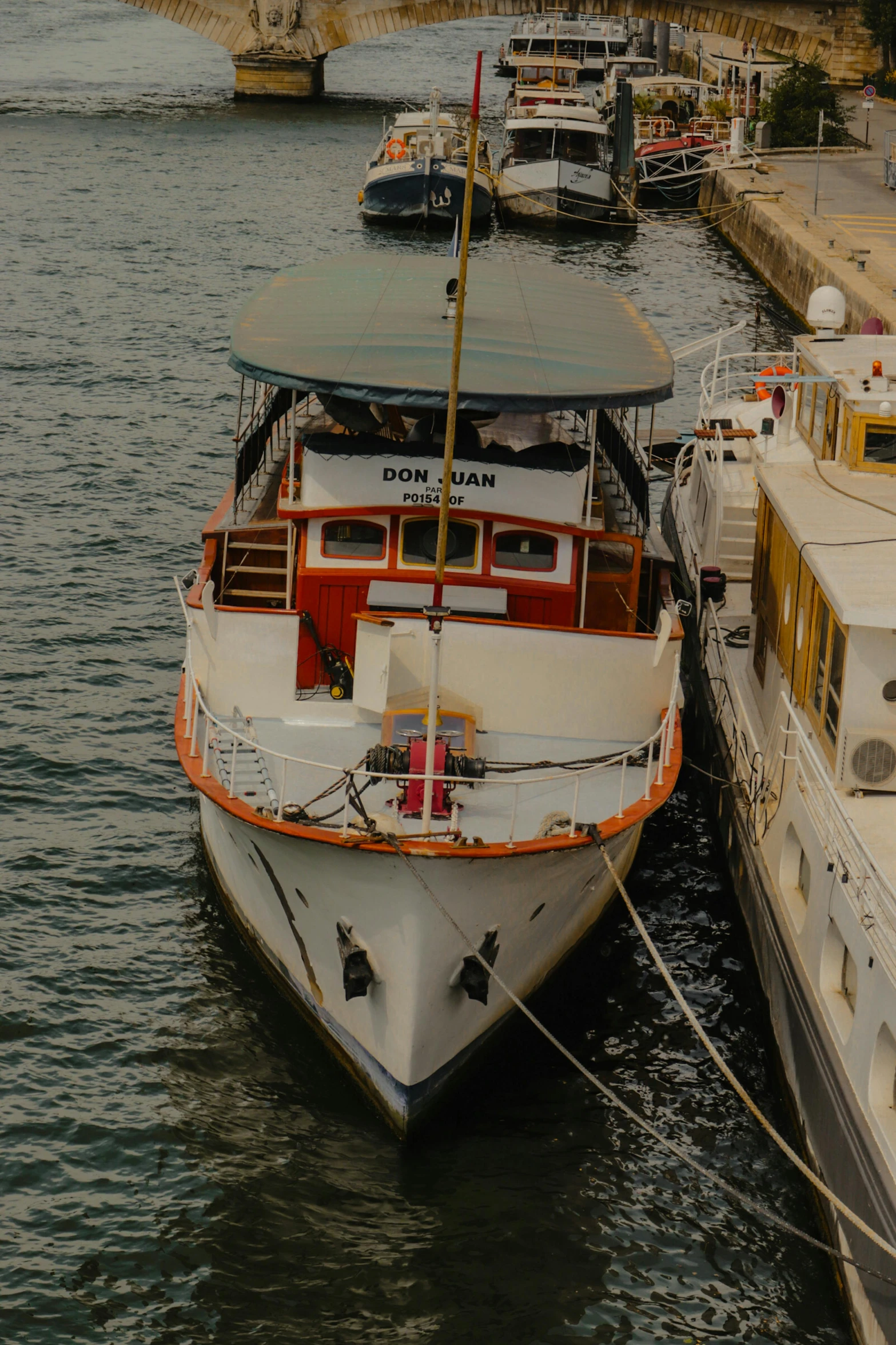 two boats that are docked in the water