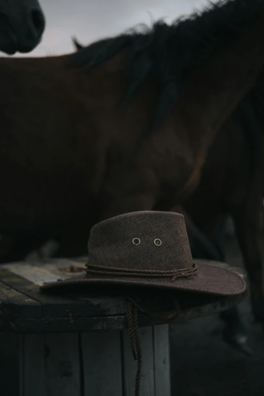 a hat sitting on top of a wooden table