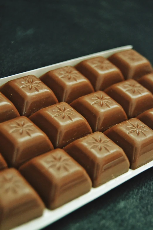 a tray of chocolate bar sitting on a table