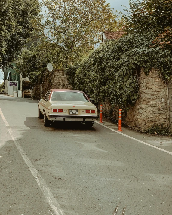 cars driving down the road during a sunny day