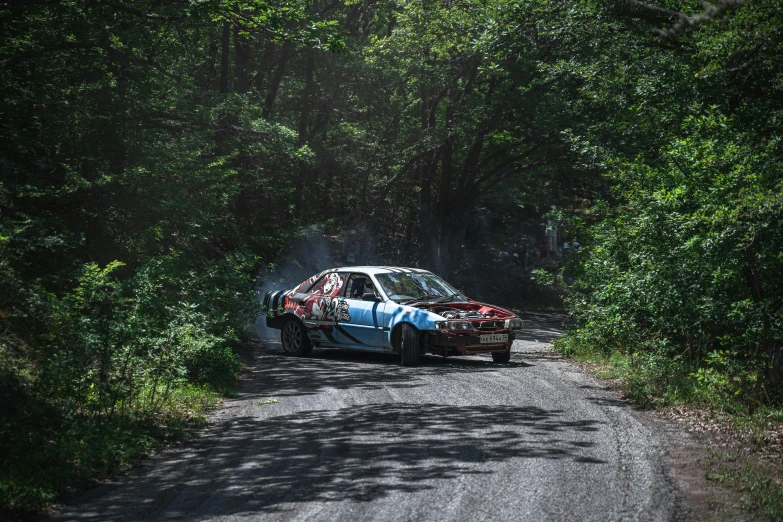 the car is parked on the side of the road