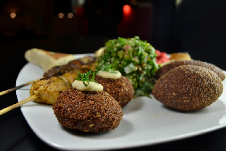 various types of food sit on a plate