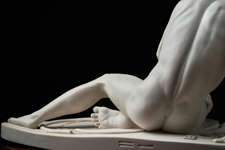 a very close up view of the body and back of a sculpture
