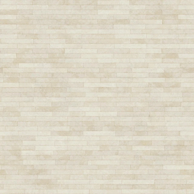 a large white brick wall with the colors beige