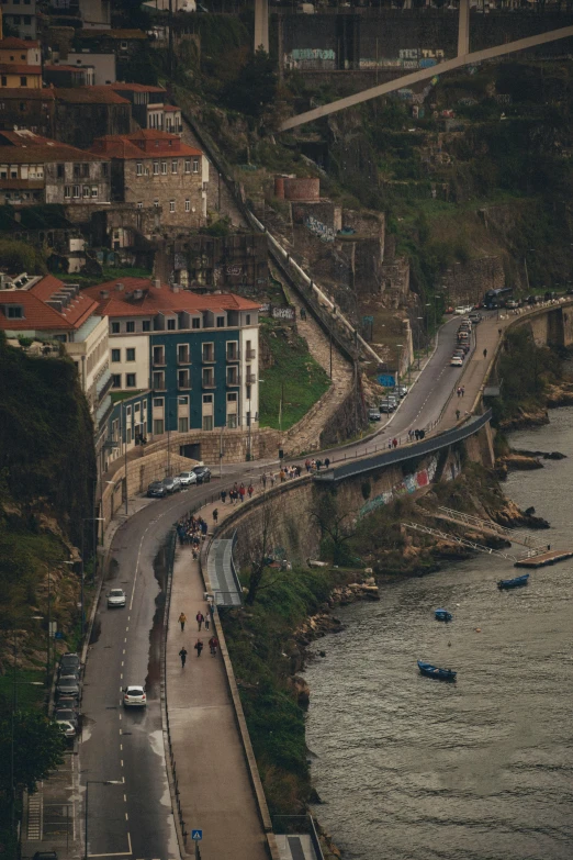 an aerial view of some buildings along a city shore