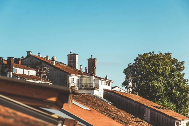 the tops of several buildings in a city