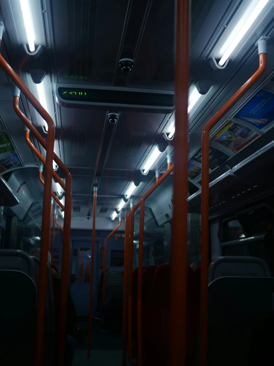 a bus full of chairs and other items in the light