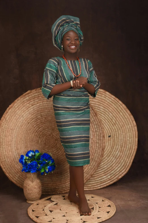 young lady standing in front of basket and smiling