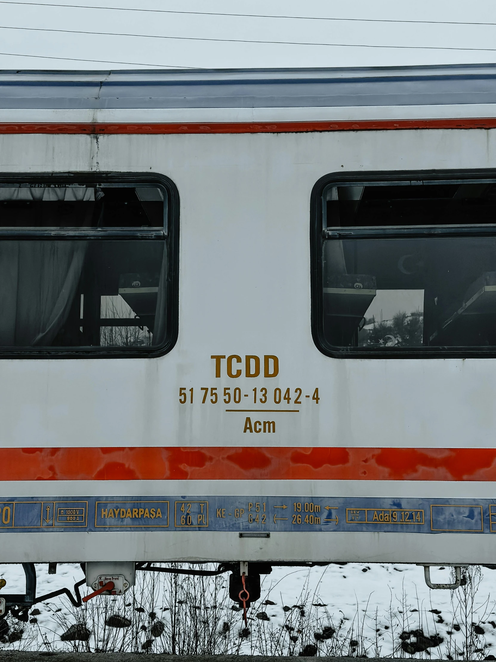 a train with two windows and the door open