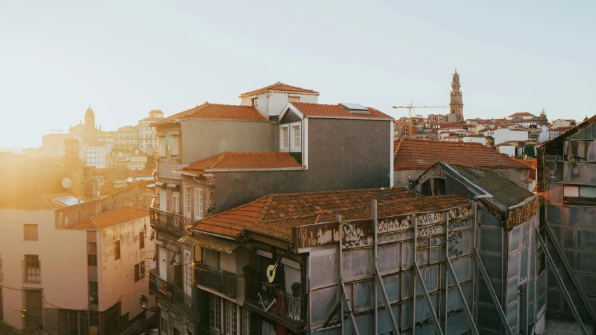 a city skyline has buildings with scaffolding on top