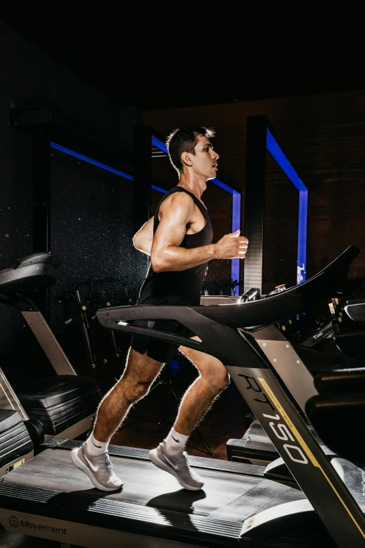 a man that is running on a treadmill