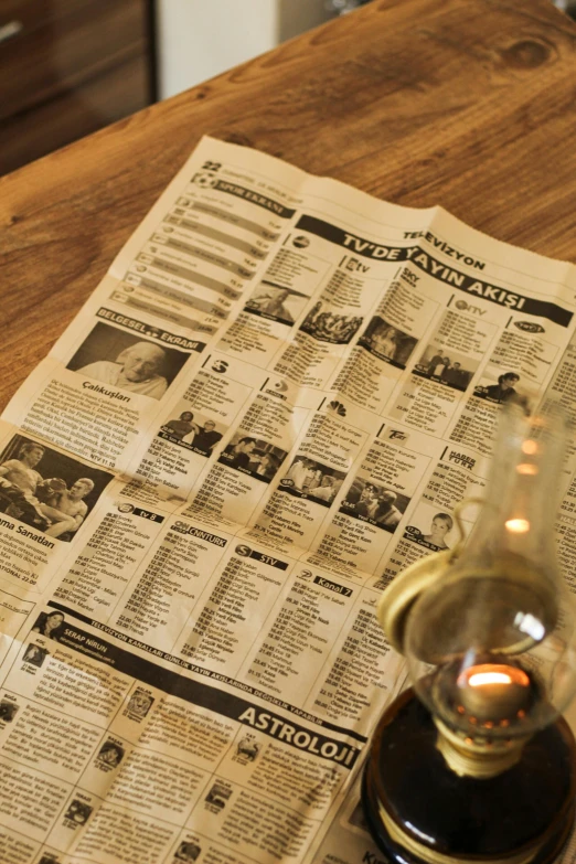 an old newspaper on top of a table