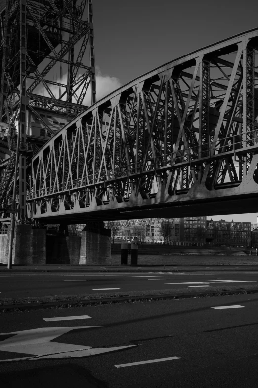 black and white pograph of an old train bridge