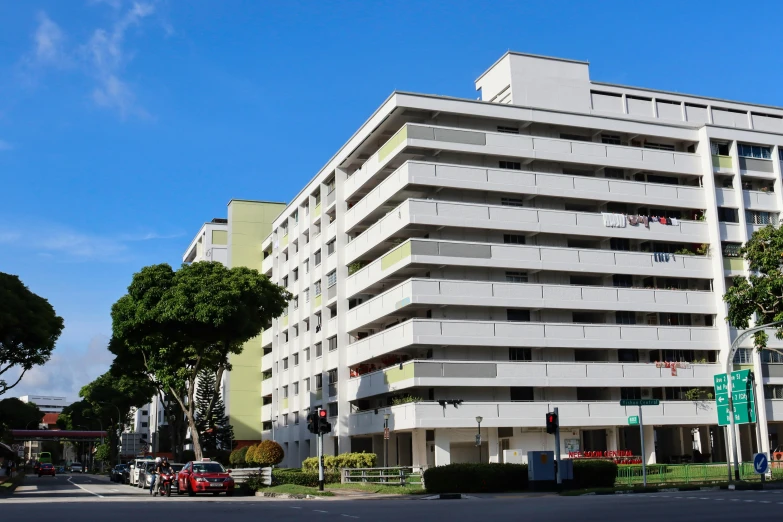 a large apartment building in an empty city