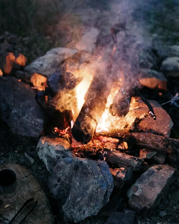 a fire with several pieces of wood in it