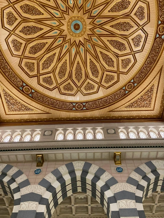 a view up to the ceiling of a building