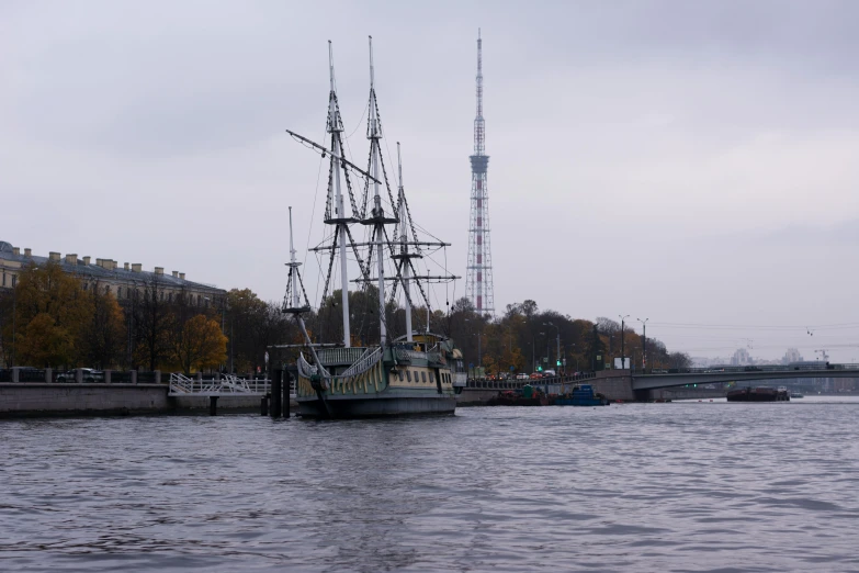 two ships next to each other near a city