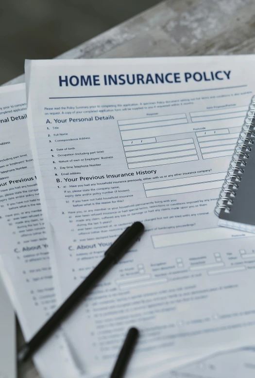 a home inspection document sitting on top of a desk