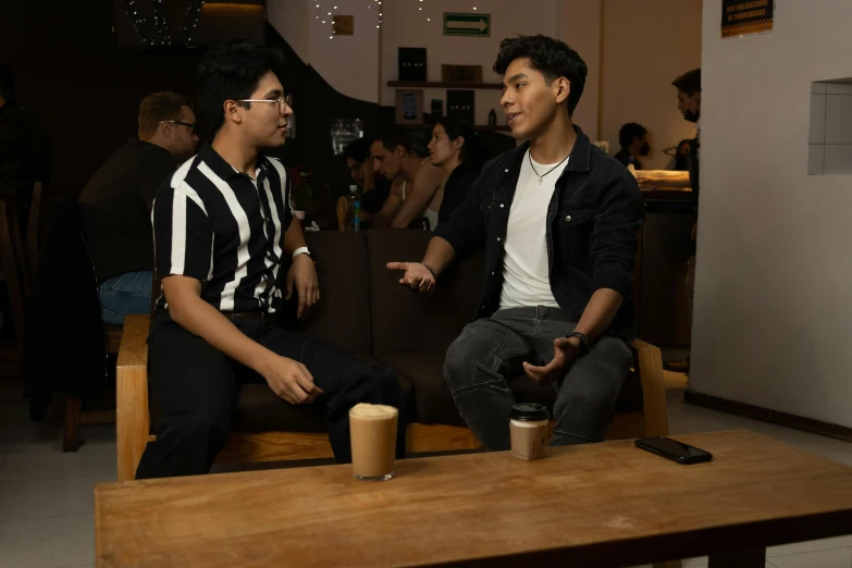 two people having a conversation in the bar