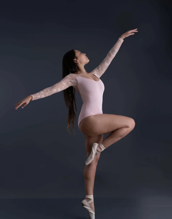 an image of a girl in a ballet pose