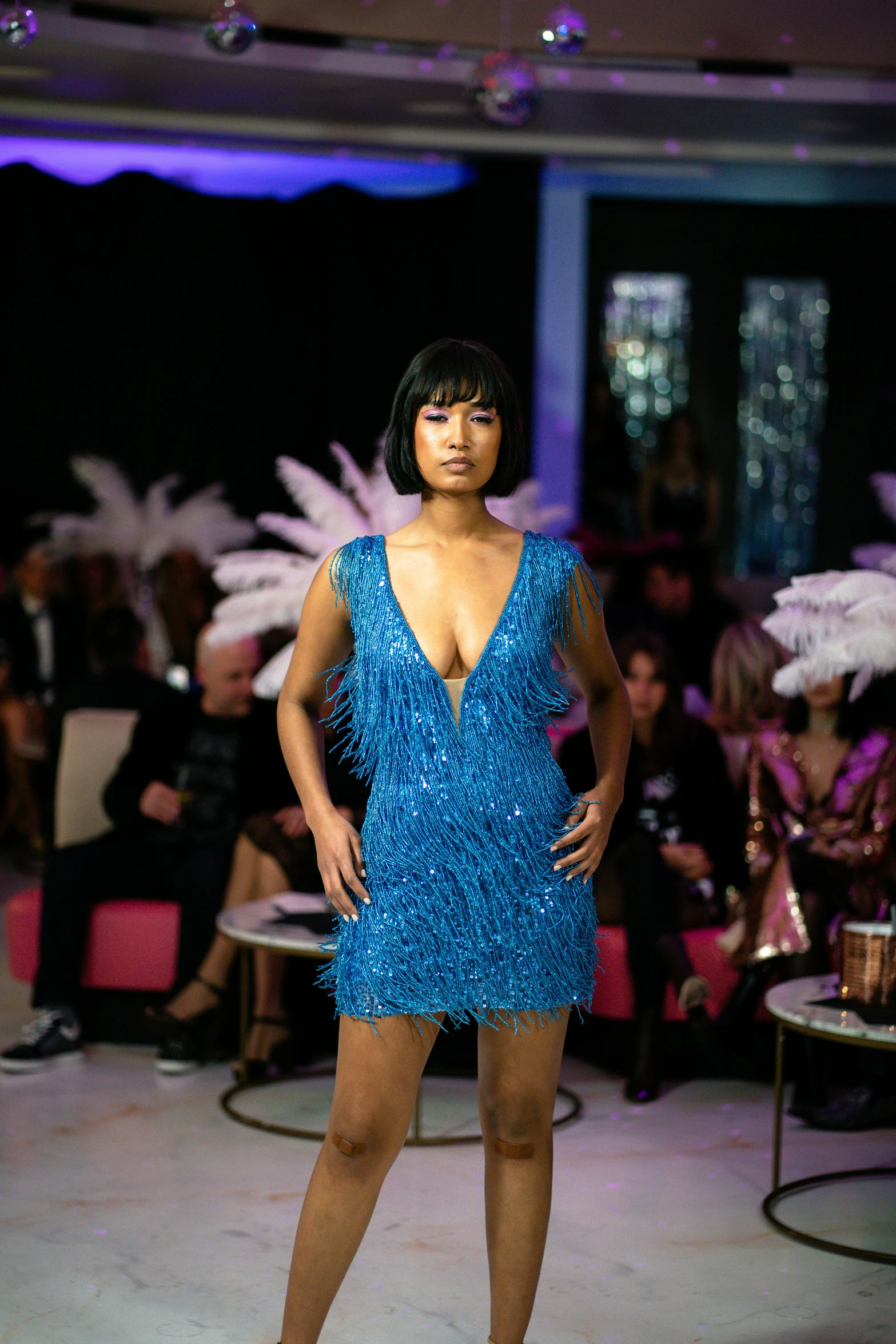 a model walks the runway at a show